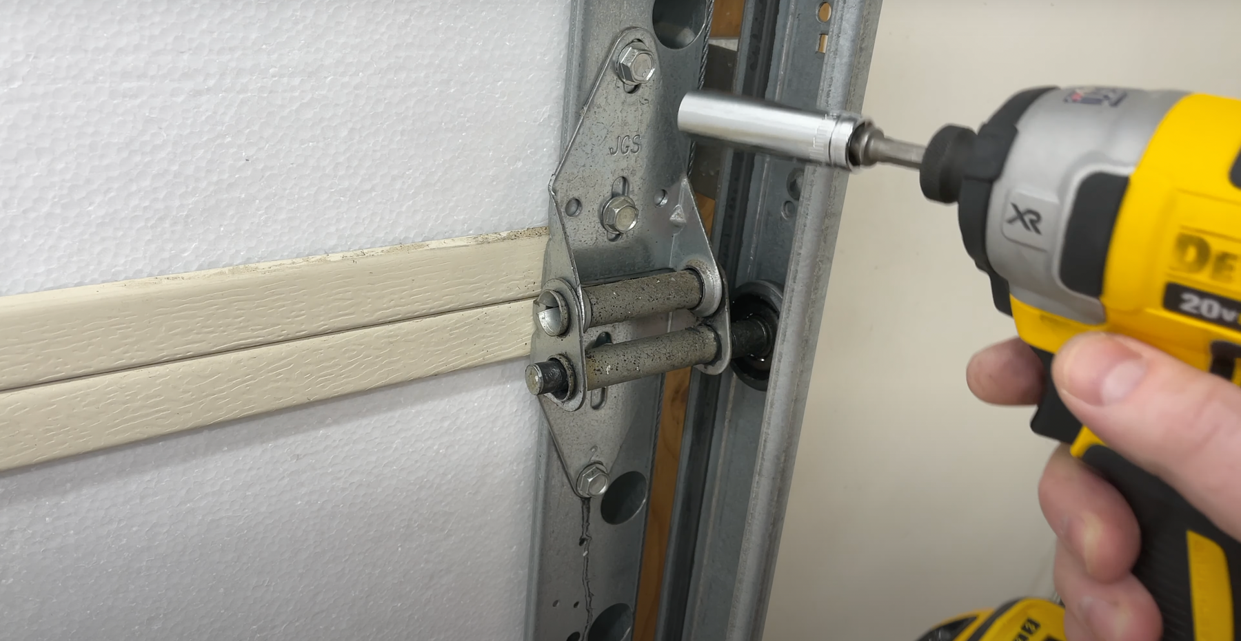 Replace Noisy, Squeaky Garage Door Hinges in Just a Few Steps