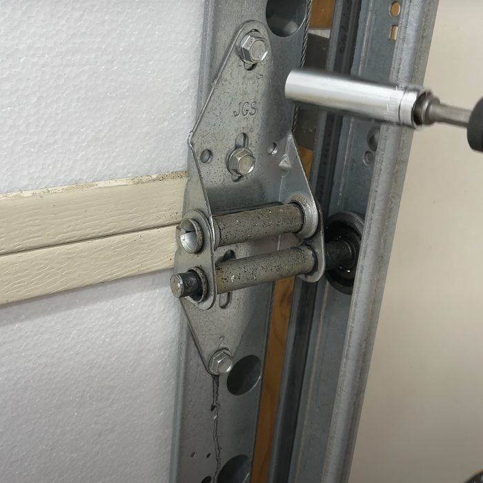 Replace Noisy, Squeaky Garage Door Hinges in Just a Few Steps